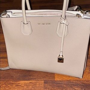 - Michael Kors medium sized nude handbag